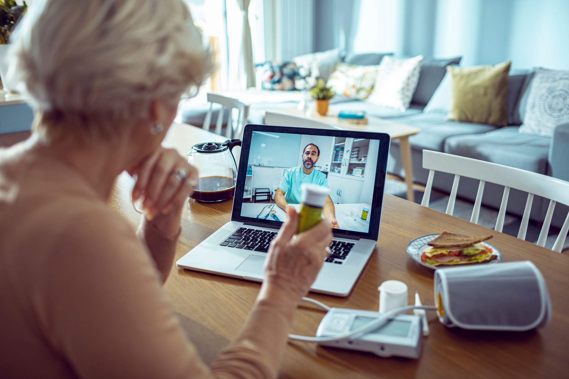 Senior Woman consulting with her doctor online Senior Woman consulting with her doctor online